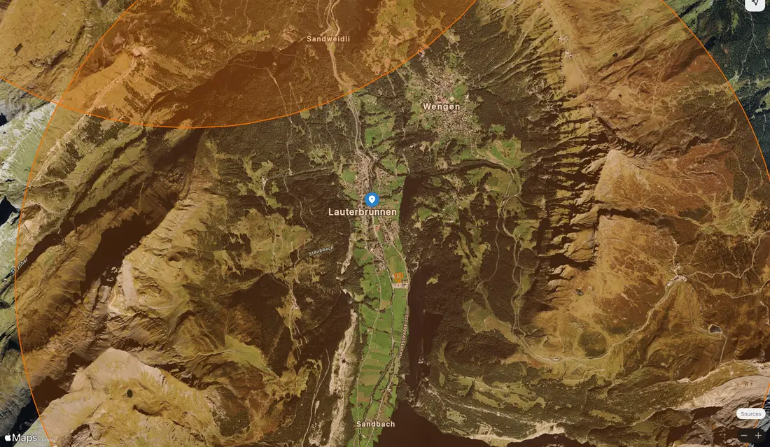 Satellite view of the Lauterbrunnen valley with the heliport zone drawn over it